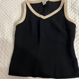 Dress lined sleeveless top.